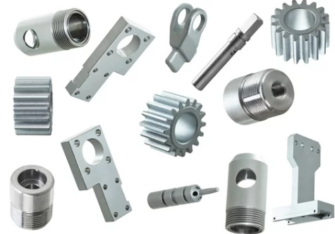 Precision-machined metal gears, shafts, brackets, and threaded components